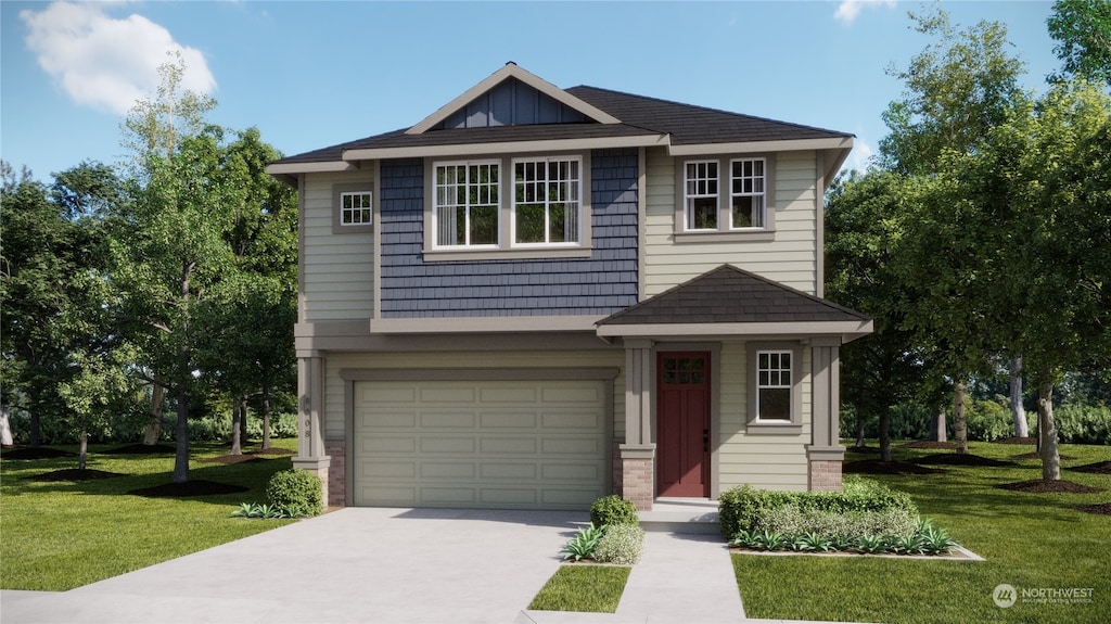 view of front of property featuring a garage and a front yard