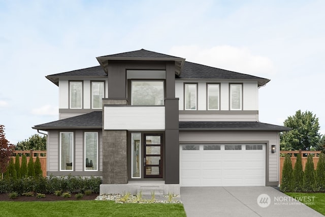 prairie-style home featuring a garage