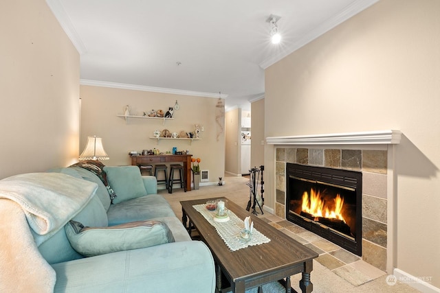 living room featuring light carpet, a fireplace, and ornamental molding