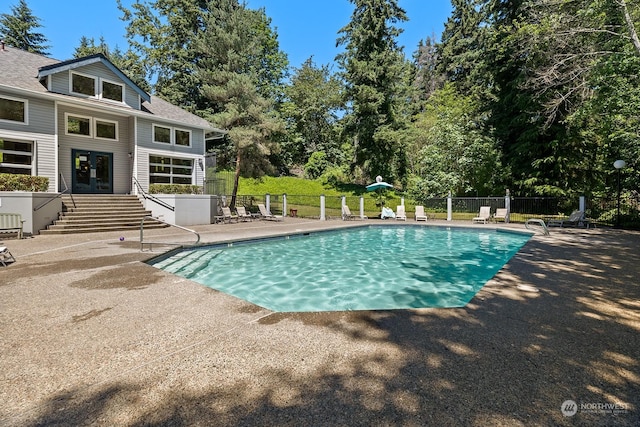 view of pool featuring a patio