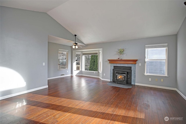 unfurnished living room with vaulted ceiling, dark wood-type flooring, and ceiling fan