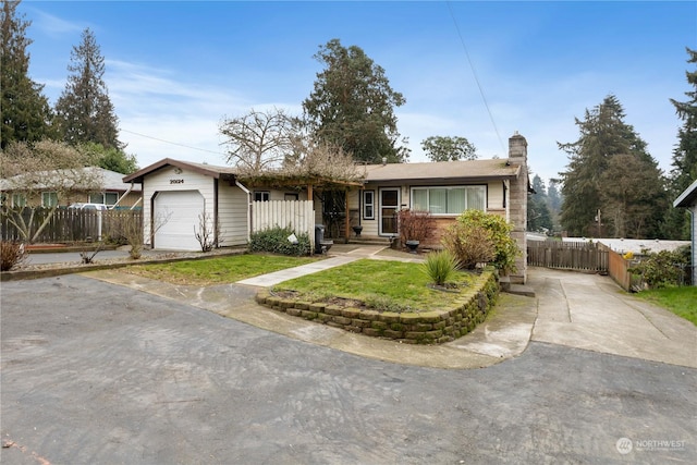 single story home featuring a garage