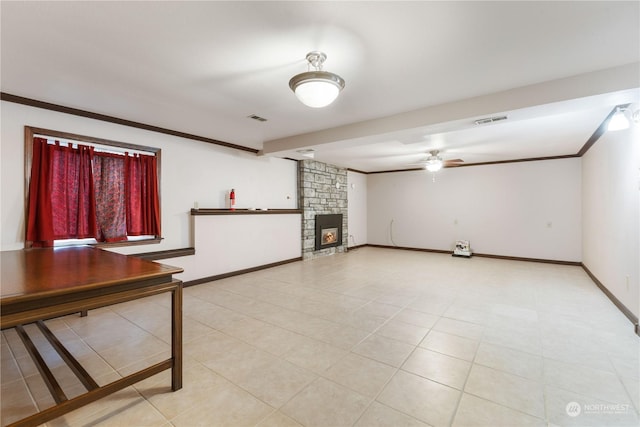 interior space featuring light tile patterned floors and a fireplace