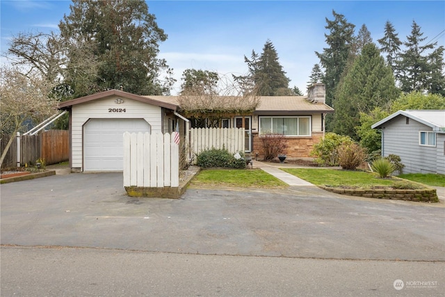 ranch-style home with a garage