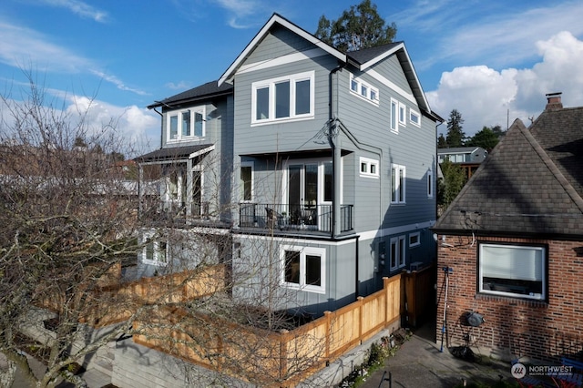 exterior space featuring a balcony