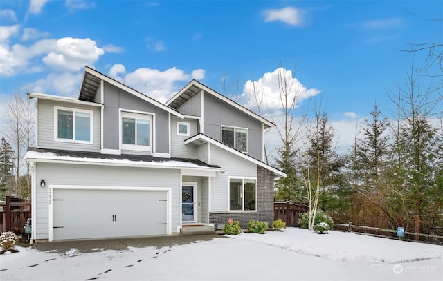 view of front of property featuring a garage