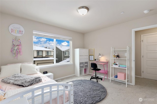 bedroom with light colored carpet