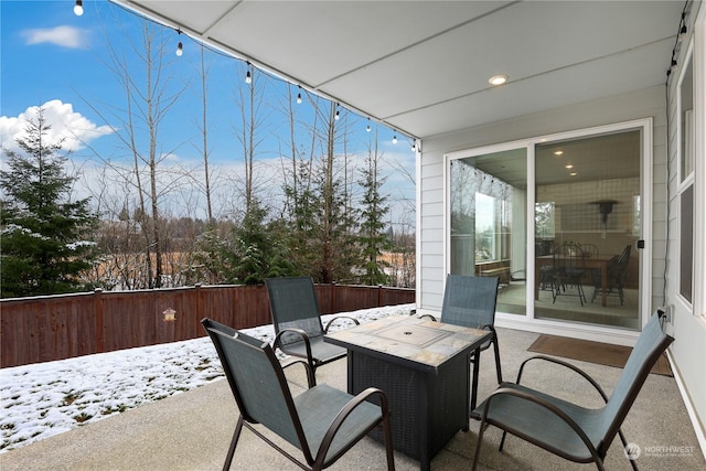 view of snow covered patio