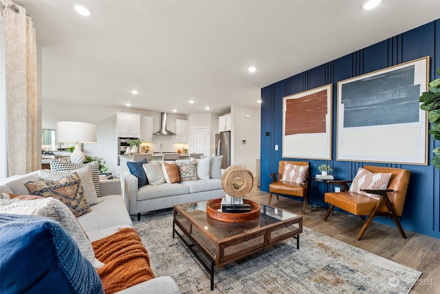 living room with light hardwood / wood-style floors