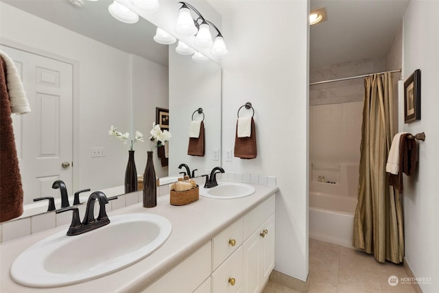 bathroom featuring shower / bath combination with curtain, vanity, and tile patterned floors