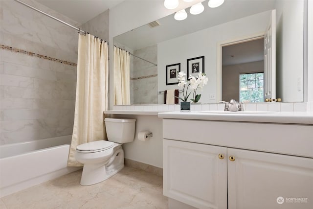 full bathroom featuring shower / tub combo with curtain, vanity, and toilet