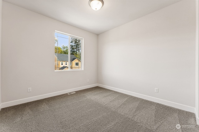 empty room featuring carpet