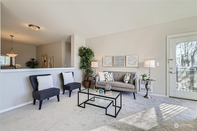 living room with light colored carpet