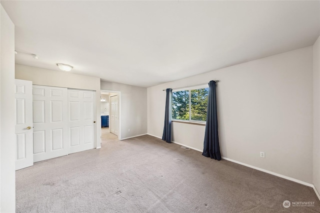 view of carpeted spare room