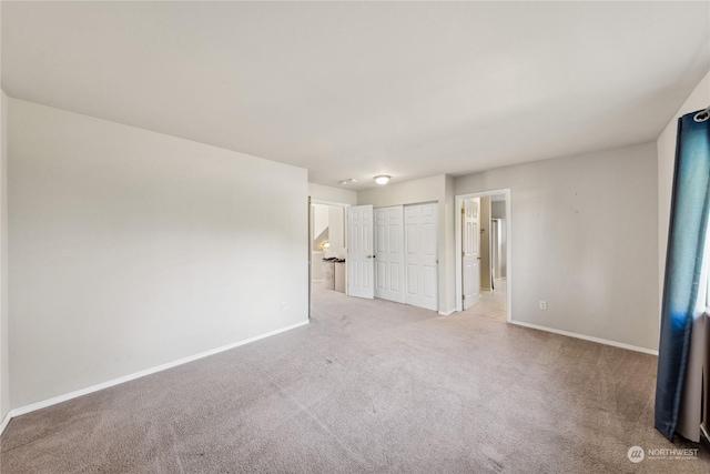 unfurnished room with carpet flooring