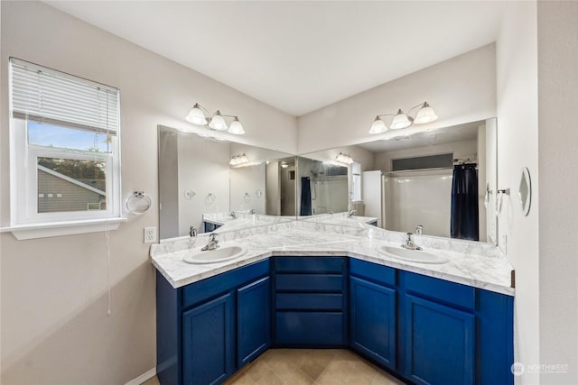 bathroom with vanity and a shower with shower curtain