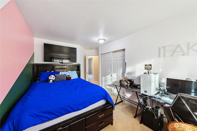 carpeted bedroom featuring a closet