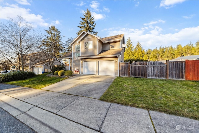 view of front property featuring a garage and a front yard