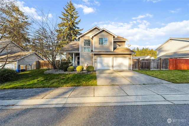 front of property featuring a garage and a front yard