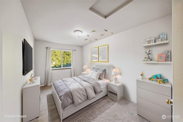 bedroom featuring light hardwood / wood-style flooring