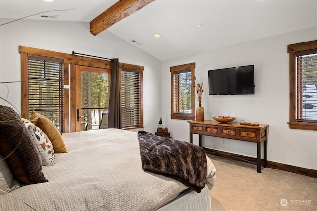 carpeted bedroom featuring multiple windows and lofted ceiling with beams