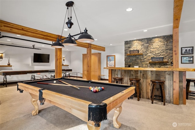 rec room with billiards, light colored carpet, and indoor bar