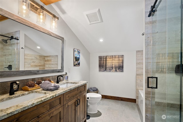 bathroom featuring vanity, vaulted ceiling, toilet, and walk in shower