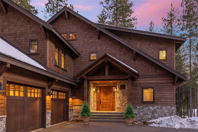 craftsman-style home featuring a garage