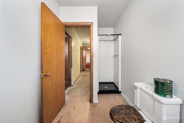 bathroom featuring a textured ceiling