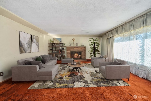 carpeted living room featuring a fireplace and a textured ceiling