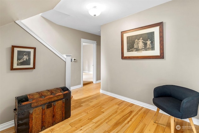 sitting room featuring hardwood / wood-style floors