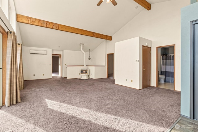 unfurnished living room featuring ceiling fan, a wall unit AC, carpet flooring, high vaulted ceiling, and beam ceiling