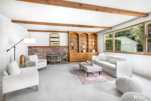 living room with carpet floors, beam ceiling, and wood walls