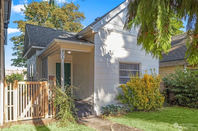 view of property exterior featuring a lawn