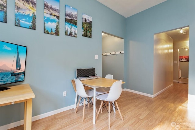 dining area with light hardwood / wood-style floors