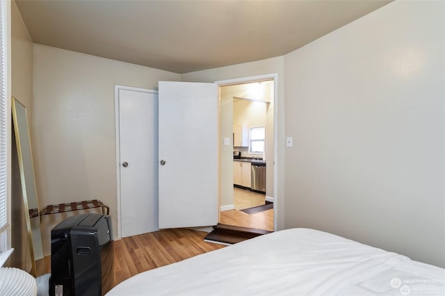 bedroom featuring hardwood / wood-style flooring