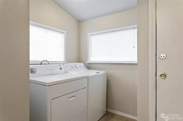 laundry room with washing machine and dryer