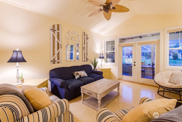 living room featuring vaulted ceiling, ceiling fan, and french doors