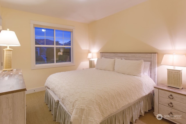 bedroom with light carpet