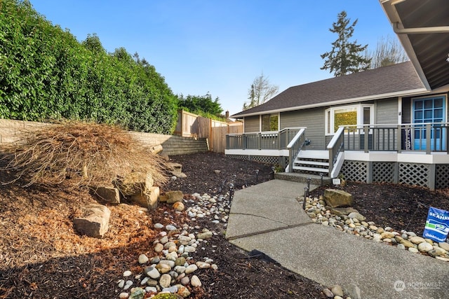 view of yard featuring a deck