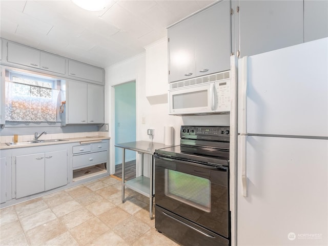 kitchen with sink and white appliances