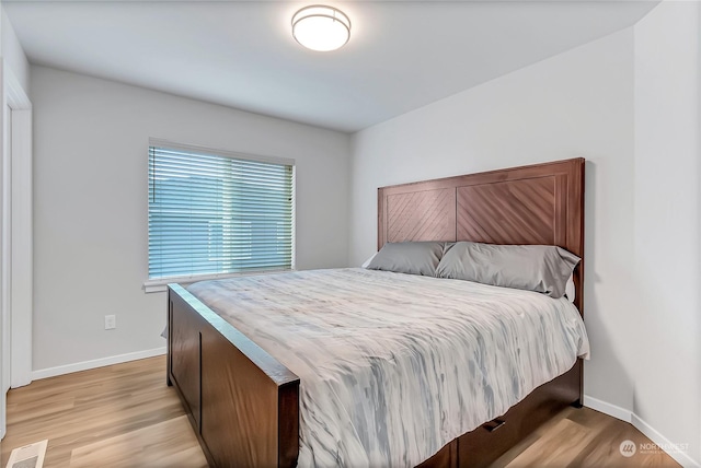 bedroom featuring light wood-type flooring