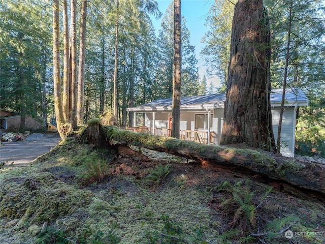 view of yard with a porch