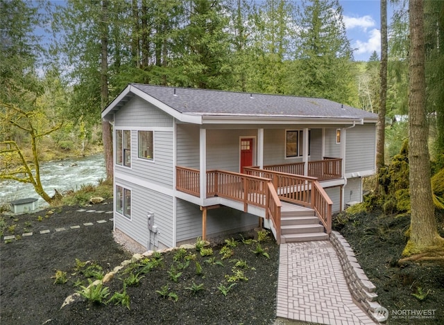 7339 Moon Valley Rd SE, North Bend, WA 98045 - view of front facade with covered porch and roof with shingles