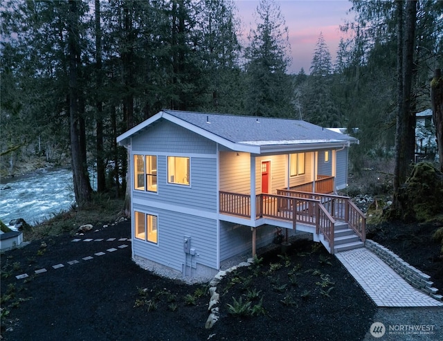 7339 Moon Valley Rd SE, North Bend, WA 98045 - view of front facade with a deck