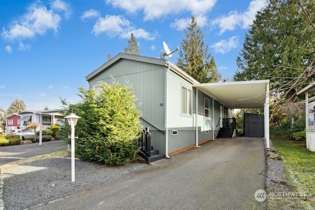 exterior space featuring a carport