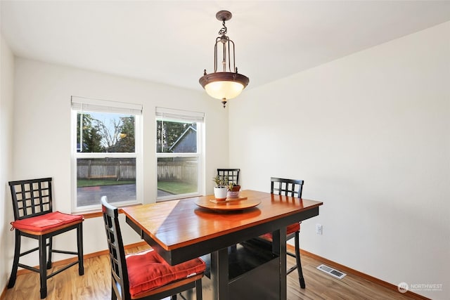 dining room featuring light hardwood / wood-style flooring