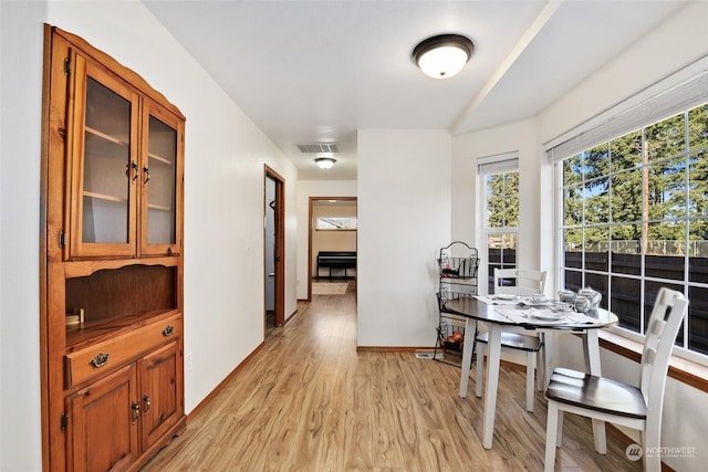 dining room featuring light wood-type flooring