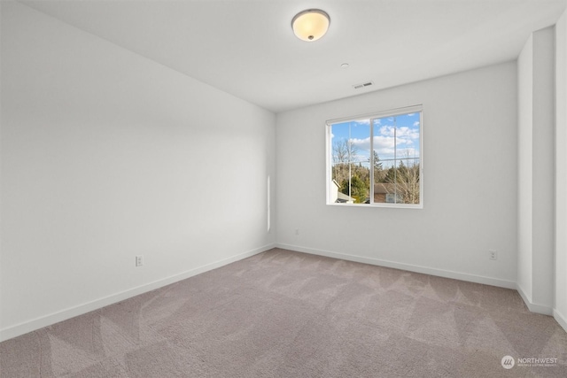 view of carpeted spare room