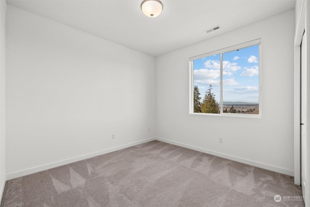 view of carpeted spare room